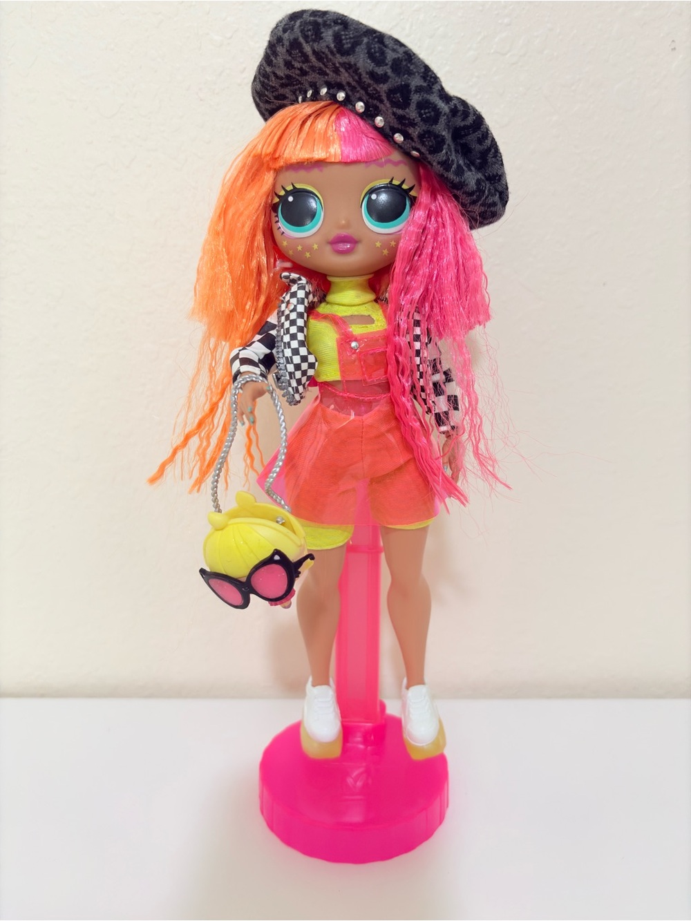 O.L. Surprise! O.M.G. Neonlicious Fashion Doll  vibrant, retro-kawaii aesthetic.